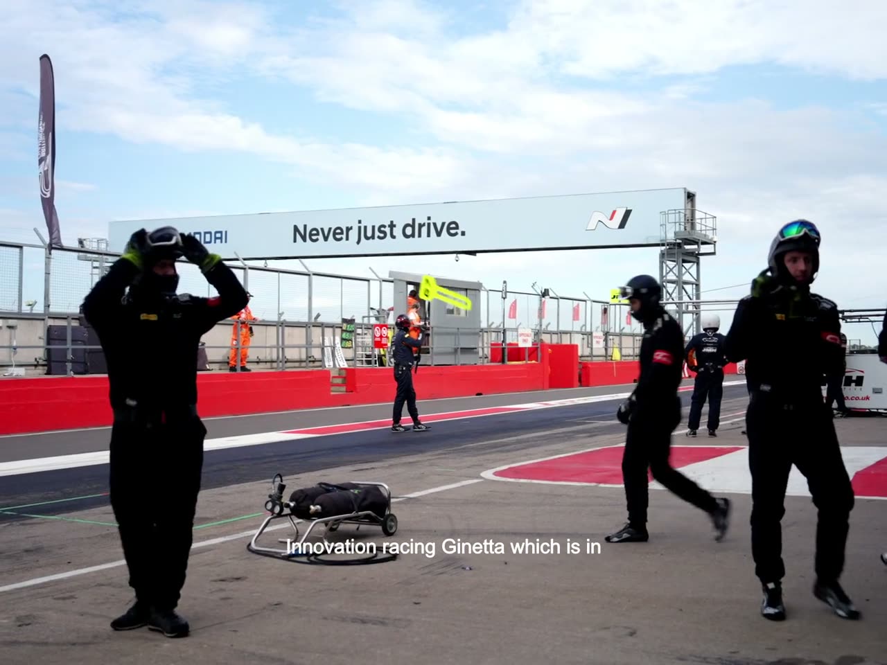 The crew on the pit lane