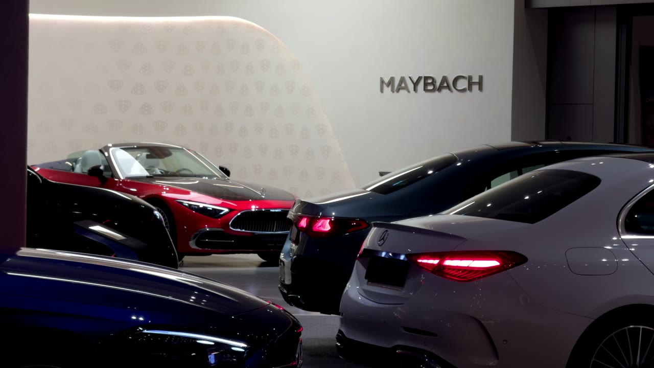 Under the Maybach sign