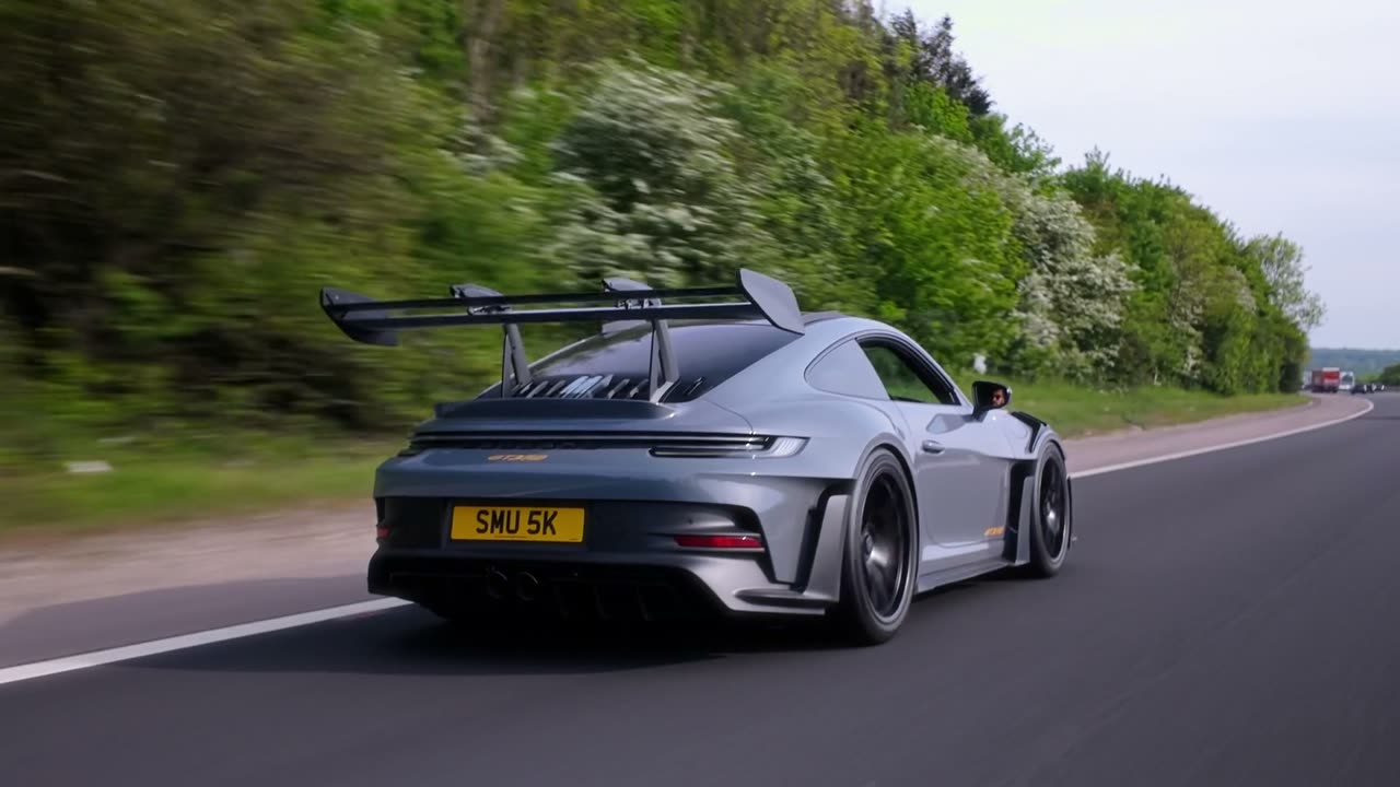 From behind, at speed